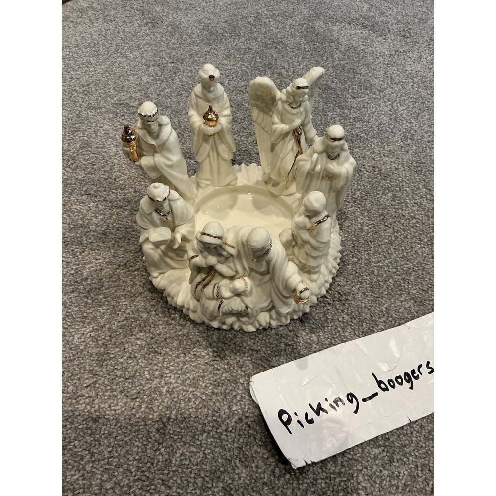 Vintage ivory and gold tone ceramic Nativity scene pillar‎ candle holder.